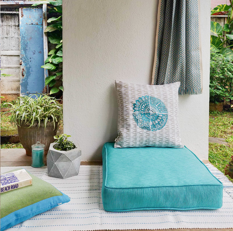 Floor Cushions on top of Rugs